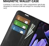 A black wallet case for a phone, showing card slots and cash. Produktbild-Vorschau