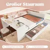 A white bed with integrated desk and storage drawers, set in a room with pink accents. Produktbild-Vorschau