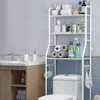 A white metal shelf unit with various bathroom items organized on its shelves, positioned above a toilet. Podgląd zdjęcia produktu