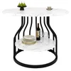 A round dining table with a marble-effect top and a black metal base, featuring a lower shelf for storage. It is set with plates, glasses, and a bottle of wine. Náhľad obrázku produktu