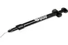 A black syringe-like applicator with a thin, curved metal tip, on a white background. Produktbild-Vorschau