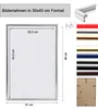 A product image showing a picture frame with dimensions and color options, along with a close-up of a frame corner and the back of a frame. Produktbild-Vorschau
