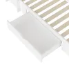 A close-up view of a white drawer pulled out from a bed frame. Anteprima dell’immagine prodotto