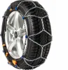 A snow chain is fitted to a car tire. Produktbild-Vorschau