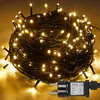 A coiled string of warm white LED lights with a power plug. Produktbild-Vorschau
