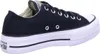 A side view of a black Converse Chuck Taylor All Star Lift Ox sneaker with a white platform sole. Voir les images du produit