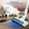 A white dog is lying on a wooden floor next to a vacuum cleaner head which is cleaning up dirt. Blue light emanates from the vacuum head. Produktbild-Vorschau