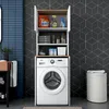 A laundry room with a washing machine and a storage unit above it. Voir les images du produit