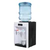 A water dispenser with a large water bottle on top, dispensing water into a glass. Náhled obrázku produktu