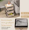 A bedside table with fabric drawers next to a sofa, with a decorative bunny on top. The image also includes marketing text and icons indicating clothing sizes. Podgląd zdjęcia produktu