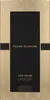 A close-up of a perfume box with a black center and gold decorative borders. Voir les images du produit