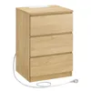A light brown wooden nightstand with three drawers and a white panel on top, featuring a power cord and plug. Náhled obrázku produktu