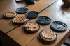 Various waffle molds with cooked waffles on a wooden table. Podgląd zdjęcia produktu