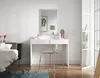 A bedroom scene with a vanity table and mirror. Produktbild-Vorschau