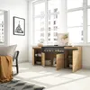 A modern living room with a sideboard featuring an electric fireplace, large windows, and a sofa with a throw blanket. Produktbild-Vorschau