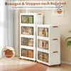 Two stacks of white storage boxes with clear doors and brown handles are shown in a room with a window and a plant. Voir les images du produit