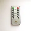 A remote control for LED candles is shown against a white background. Produktbild-Vorschau