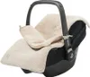 A baby car seat with a knitted cover. Anteprima dell’immagine prodotto