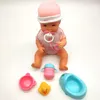 A Nenuco Sara interactive doll with accessories laid out in front of it on a white background. Produktbild-Vorschau