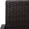 A close-up view of the woven texture of a brown rattan bench. Podgląd zdjęcia produktu