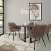 A dining set with chairs around a table, in a modern room setting. Náhľad obrázku produktu