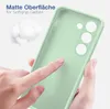A hand touching a light green phone case, with fluffy white material in the background. Produktbild-Vorschau