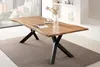 A dining table and chairs set in a modern dining room with a large window overlooking a city. Produktbild-Vorschau