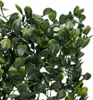 A close-up view of artificial green leaves. Náhľad obrázku produktu