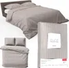 A collage of images showing a bed with bedding, pillows, and a packaged set of bedding. Anteprima dell’immagine prodotto
