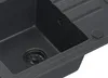 A close-up view of a black granite kitchen sink. Produktbild-Vorschau