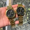 Two gold Casio watches with black faces are held by a person's hand. Náhled obrázku produktu