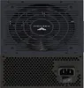 The back of a black computer power supply unit. Produktbild-Vorschau