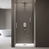 A modern shower enclosure with a sleek design, featuring a glass door, shower head, and handheld shower. Produktbild-Vorschau