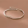 Eleganter Damen Armreif mit Doppel-Kette – Silberfarben, Produktbild-Vorschau 1