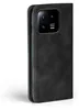 A black flip cover phone case is shown from the side, with the camera module visible. Produktbild-Vorschau