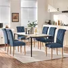 A dining room scene with a table and chairs. Produktbild-Vorschau