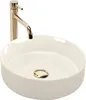 A white ceramic vessel sink with a gold faucet and drain. Náhľad obrázku produktu