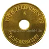 A golden token with text and a hole in the center, isolated on a white background. Produktbild-Vorschau