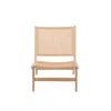 A single rattan armchair is shown against a white background. Náhľad obrázku produktu
