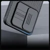 A close-up shot of a black phone case with a textured pattern and a sliding camera cover. Náhľad obrázku produktu