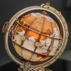 A close-up shot of a wooden globe model with internal lighting. Náhľad obrázku produktu