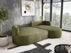 A modern living room with a green sectional sofa, a large window overlooking trees, and abstract art on the wall. Náhľad obrázku produktu
