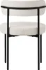 A white upholstered chair with black metal legs is shown from the front against a white background. Produktbild-Vorschau