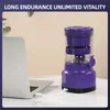 A purple electric citrus juicer is connected to a laptop via a USB cable, suggesting portability and convenience. Podgląd zdjęcia produktu