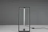 A modern, rectangular LED table lamp with a black frame and a white light element, placed on a light gray surface against a gray background. Náhľad obrázku produktu