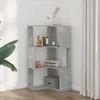 A corner bookshelf with decorative items on a wooden floor next to a curtain. Náhled obrázku produktu