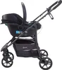 A black baby stroller with a car seat attached, shown from the side against a white background. Produktbild-Vorschau