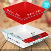 A digital kitchen scale with a red measuring bowl stacked on top of it. Dimensions are shown with blue lines and text. Produktbild-Vorschau