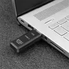A card reader is plugged into a laptop. Produktbild-Vorschau