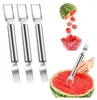A set of watermelon cutters and a watermelon being cut into cubes. Produktbild-Vorschau